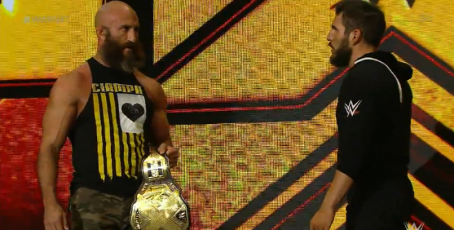 At the top of the ramp, nXt Champion Tommaso Ciampa and Johnny Gargano stare one another down, unsure about one another's motives, following what became an unplanned joint attack on Ricochet and Aleister Black