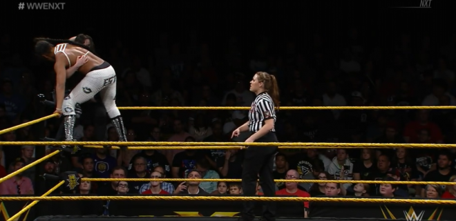 Belair and Cross are tied up on the top turnbuckle during their January 9th match on nXt.