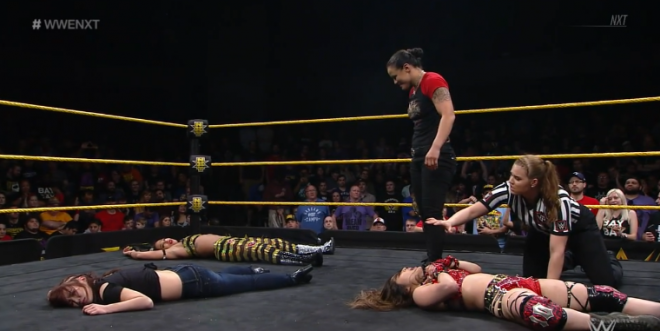 Baszlers urveys the devastation she has caused by submitting Shirai, Belair and Sane on March 13th WWE nXt TV.