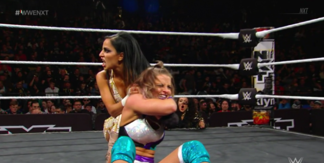 Aliyah locks LeRae in a front headlock during their match on April 10th nXt TV.
