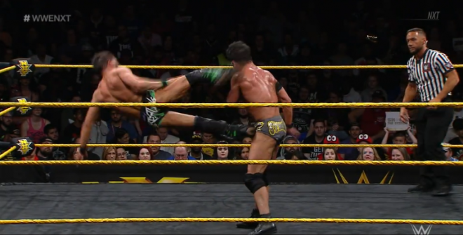 Gargano's in mid-dropkick to the head of Strong, nearing the final fall of their Apr 24 nXt singles match.