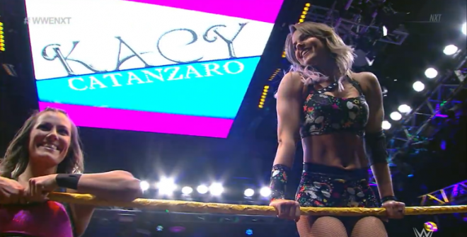Catanzaro and LeRae pose on the ropes before their match on April 24, nXt.
