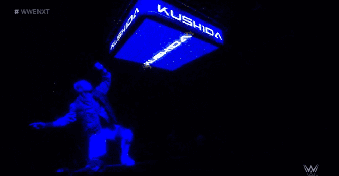 Kushida's entrance, bathed in blue, perched on the turnbuckle on July 3, 2019 nXt TV