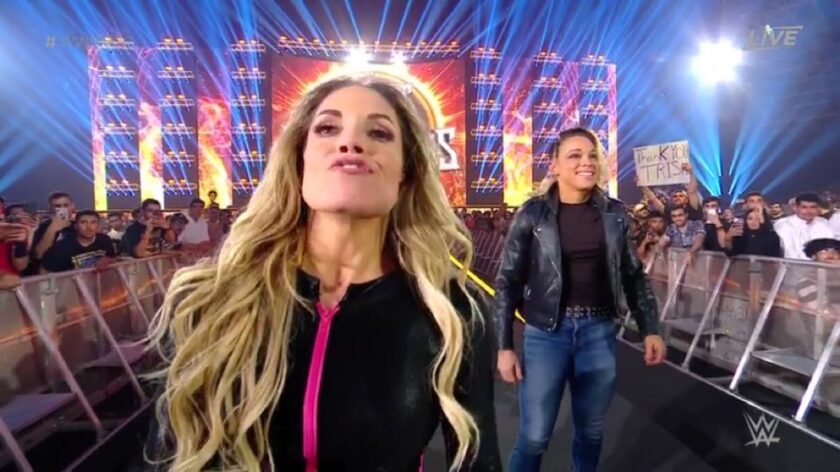 WWE's Trish Stratus Assesses Cage Match Performance, Explains Approach