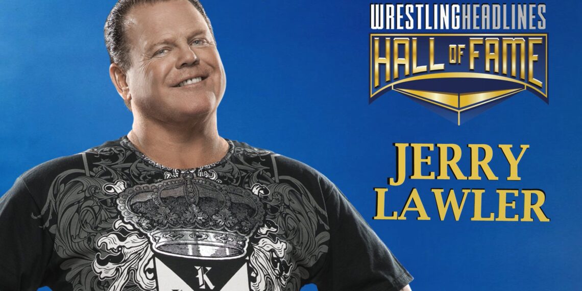 Jerry Lawler stands with a big smile on his face and his black and grey King t-shirt on.